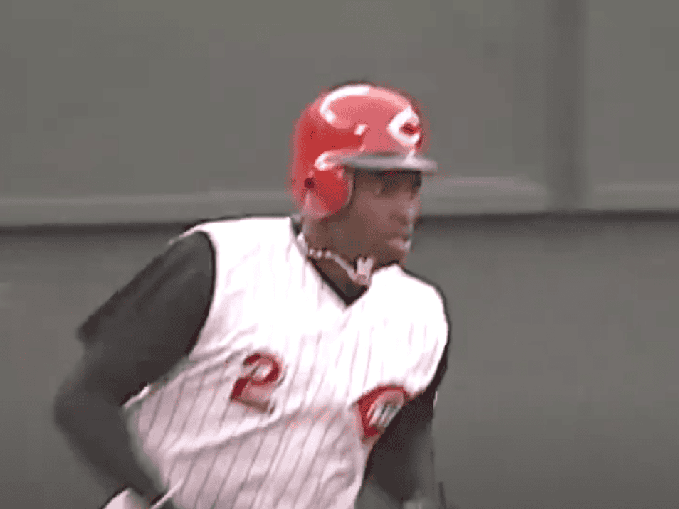 Deion Sanders showcasing his dual dominance in baseball and football.